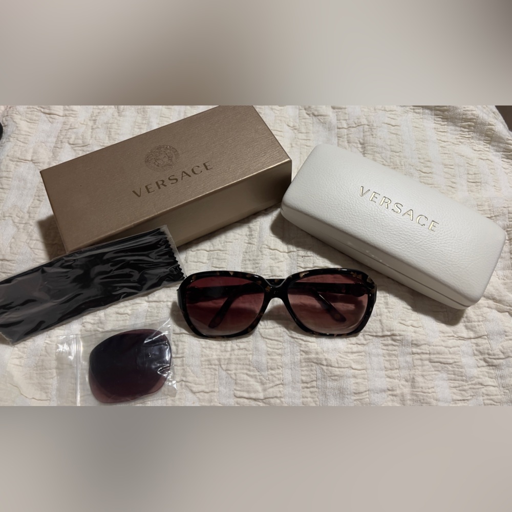 Versace Women’s Sunglasses - Tortoise frames